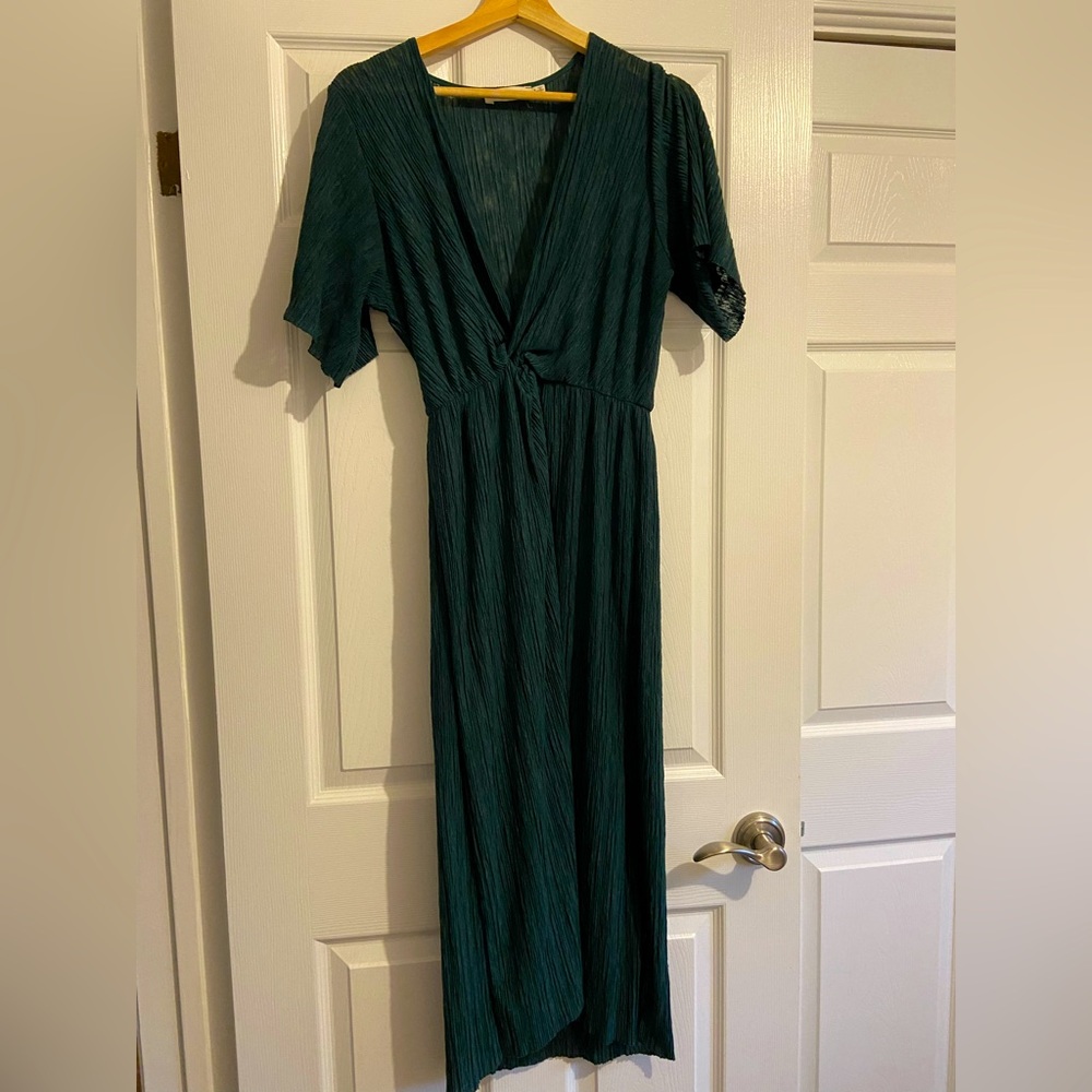 Long faux wrap dress. Deep v neckline, high front slit.